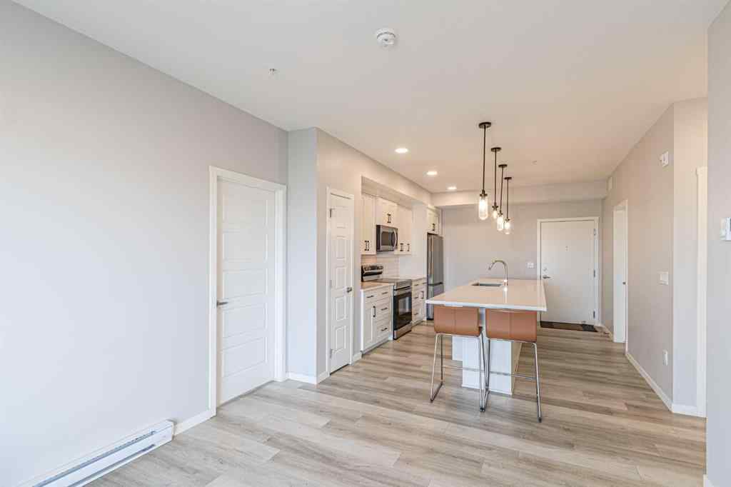 MLS® A2254996 - Unit #203 360 Harvest Hills Way NE in Harvest Hills Calgary, Residential