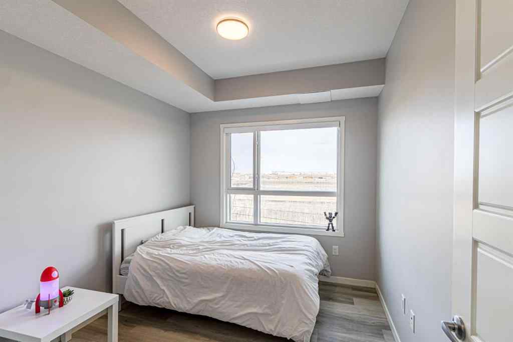 MLS® A2254996 - Unit #203 360 Harvest Hills Way NE in Harvest Hills Calgary, Residential