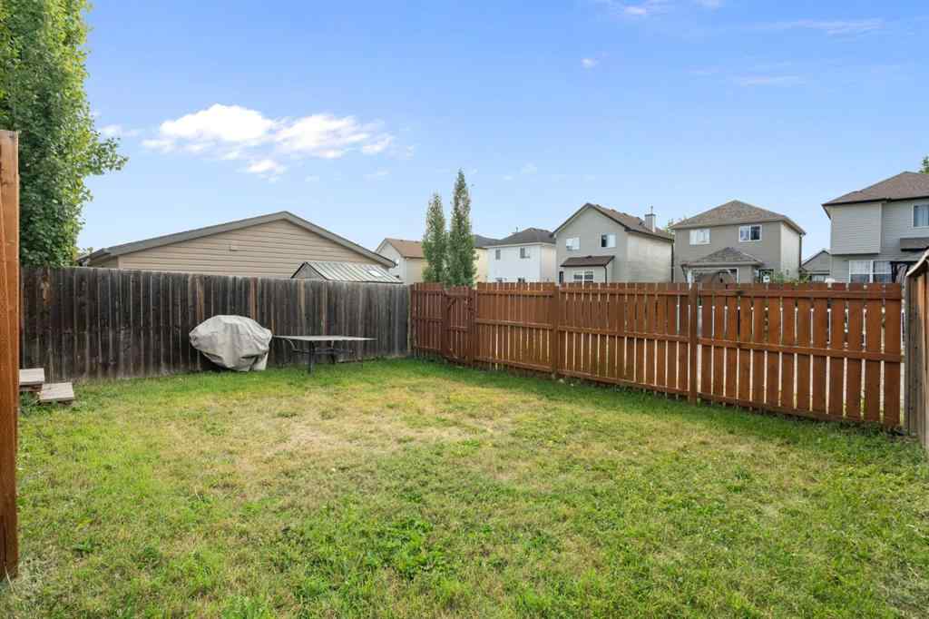 MLS® A2255004 - 61 Everglen Way SW in Evergreen Calgary, Residential