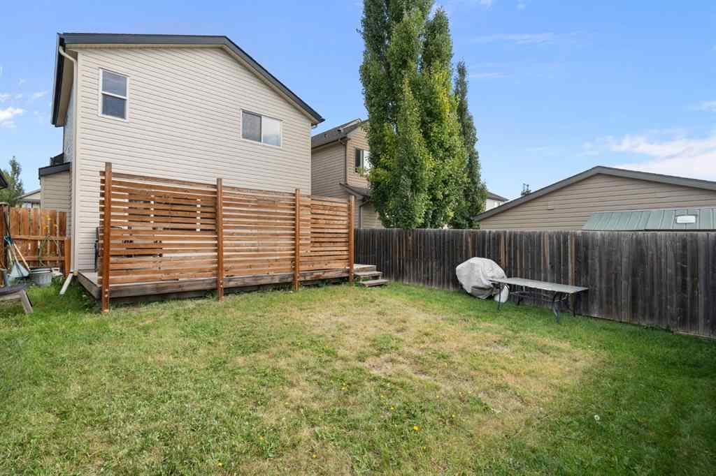 MLS® A2255004 - 61 Everglen Way SW in Evergreen Calgary, Residential