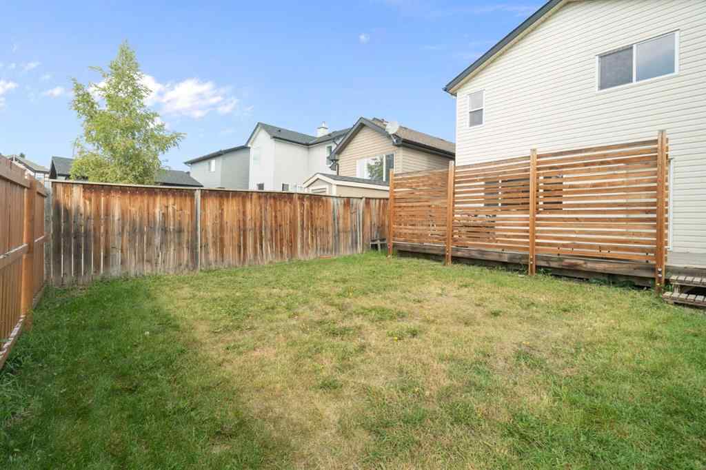 MLS® A2255004 - 61 Everglen Way SW in Evergreen Calgary, Residential