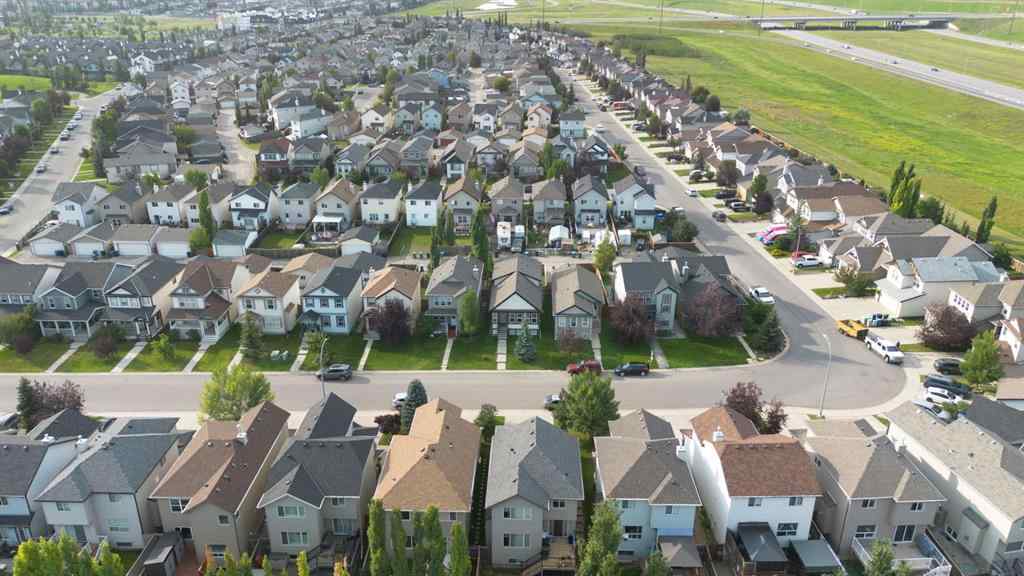 MLS® A2255004 - 61 Everglen Way SW in Evergreen Calgary, Residential