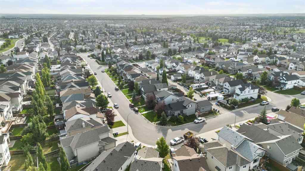 MLS® A2255004 - 61 Everglen Way SW in Evergreen Calgary, Residential