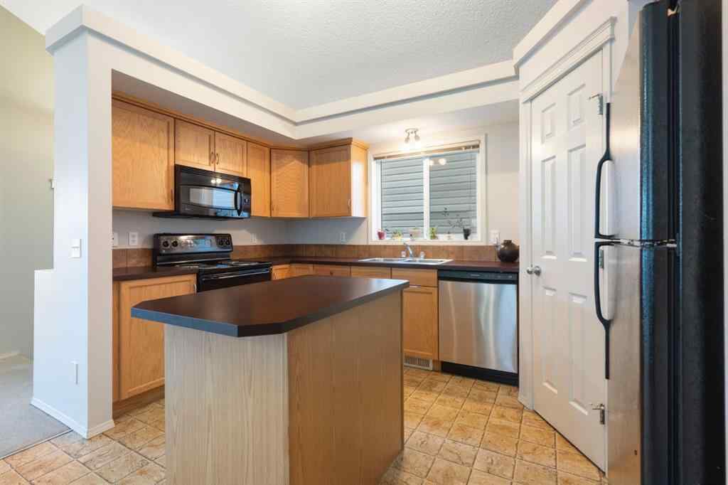 MLS® A2255004 - 61 Everglen Way SW in Evergreen Calgary, Residential