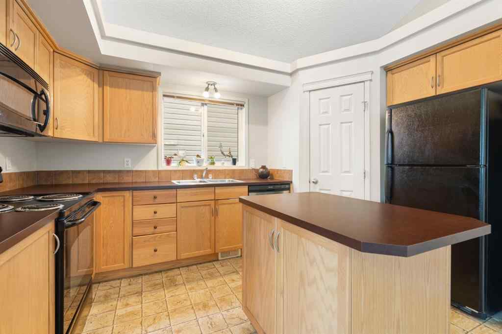 MLS® A2255004 - 61 Everglen Way SW in Evergreen Calgary, Residential