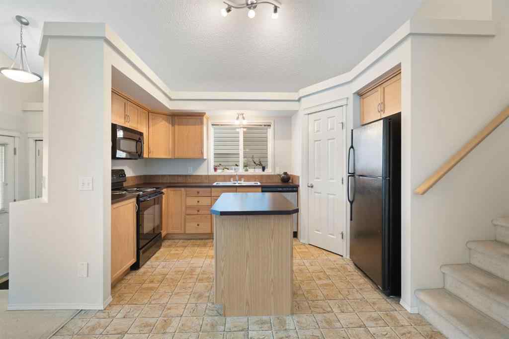 MLS® A2255004 - 61 Everglen Way SW in Evergreen Calgary, Residential