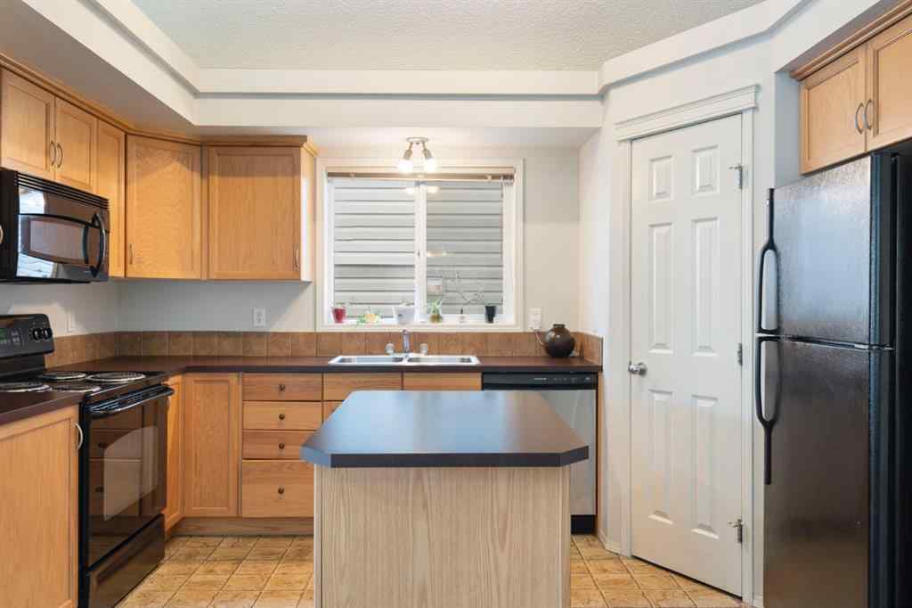 MLS® A2255004 - 61 Everglen Way SW in Evergreen Calgary, Residential