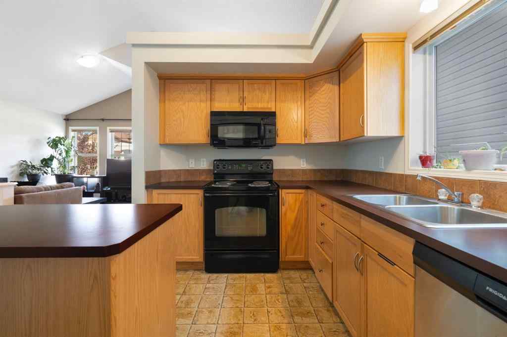 MLS® A2255004 - 61 Everglen Way SW in Evergreen Calgary, Residential