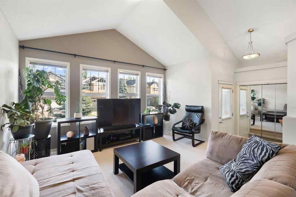 MLS® A2255004 - 61 Everglen Way SW in Evergreen Calgary, Residential