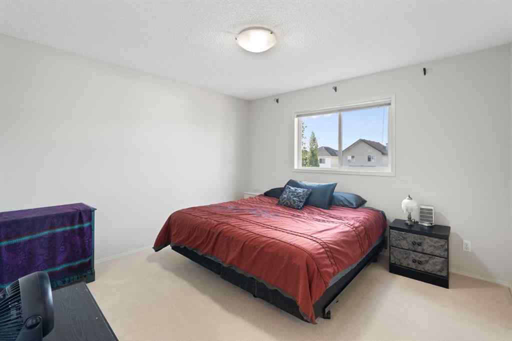 MLS® A2255004 - 61 Everglen Way SW in Evergreen Calgary, Residential