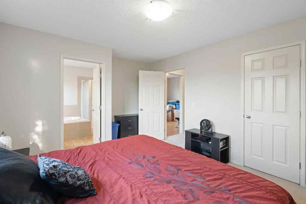 MLS® A2255004 - 61 Everglen Way SW in Evergreen Calgary, Residential