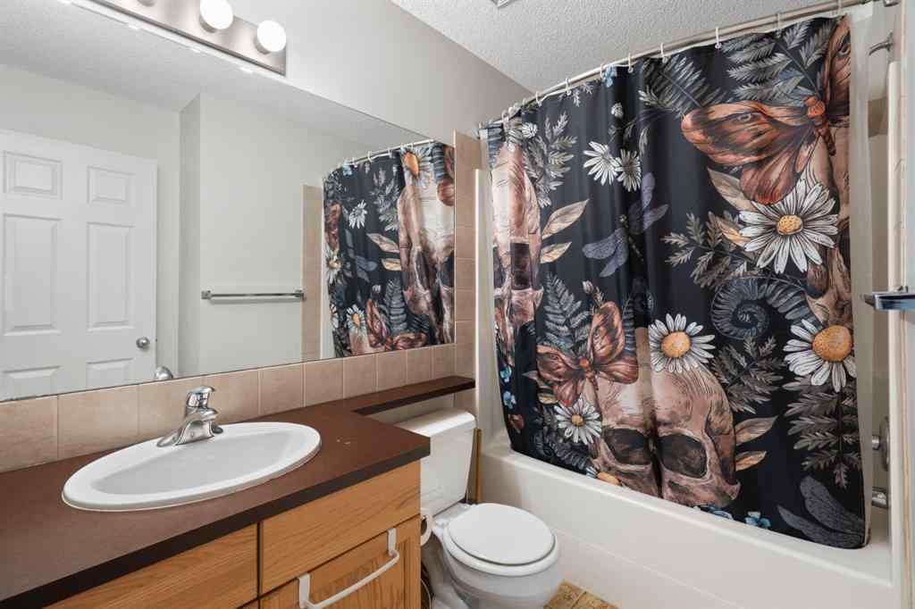 MLS® A2255004 - 61 Everglen Way SW in Evergreen Calgary, Residential