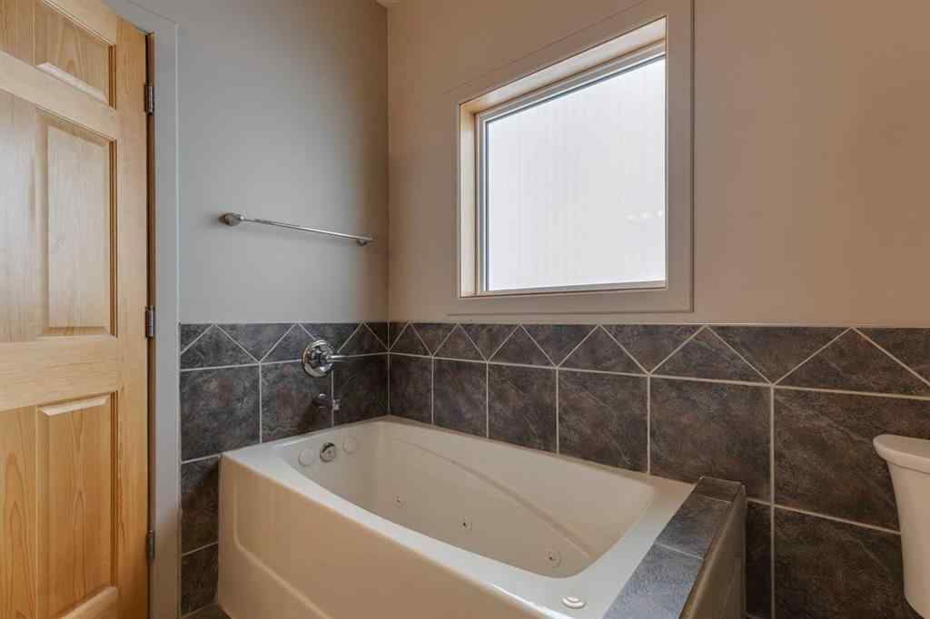 MLS® A2255007 - 225 Bayside Place SW in Bayside Airdrie, Residential
