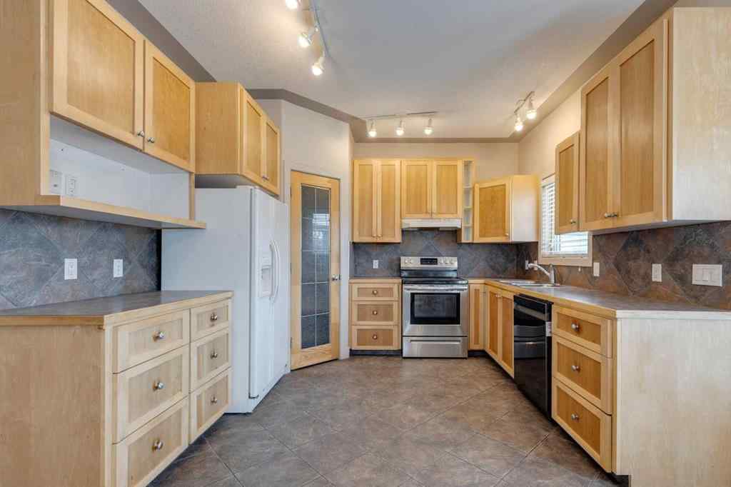 MLS® A2255007 - 225 Bayside Place SW in Bayside Airdrie, Residential