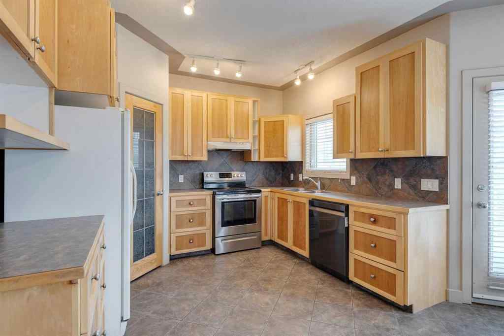 MLS® A2255007 - 225 Bayside Place SW in Bayside Airdrie, Residential