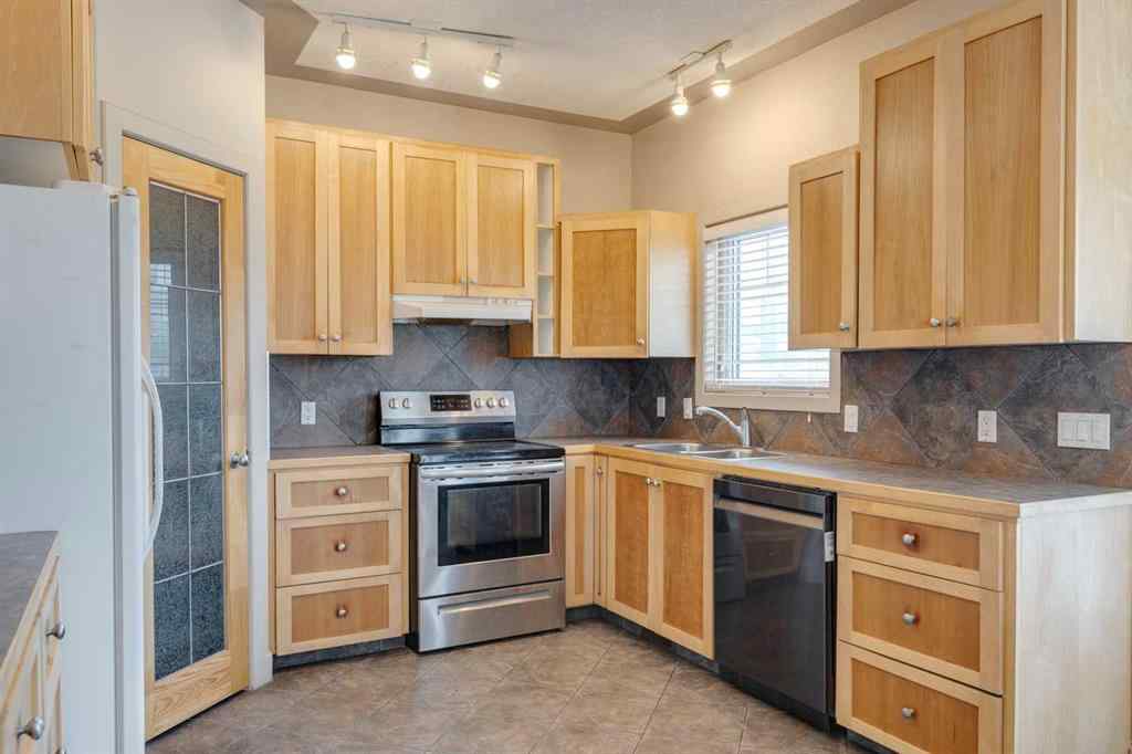 MLS® A2255007 - 225 Bayside Place SW in Bayside Airdrie, Residential