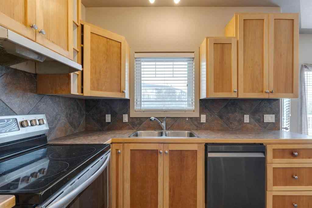 MLS® A2255007 - 225 Bayside Place SW in Bayside Airdrie, Residential