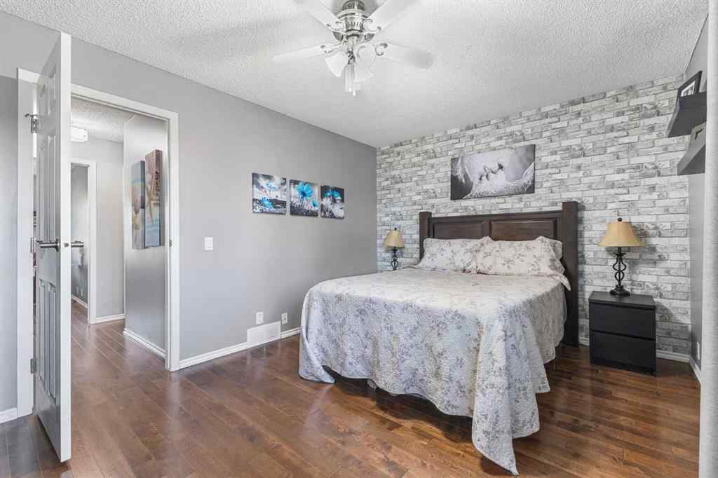 MLS® A2255008 - 67 Woodhill Court SW in Woodlands Calgary, Residential