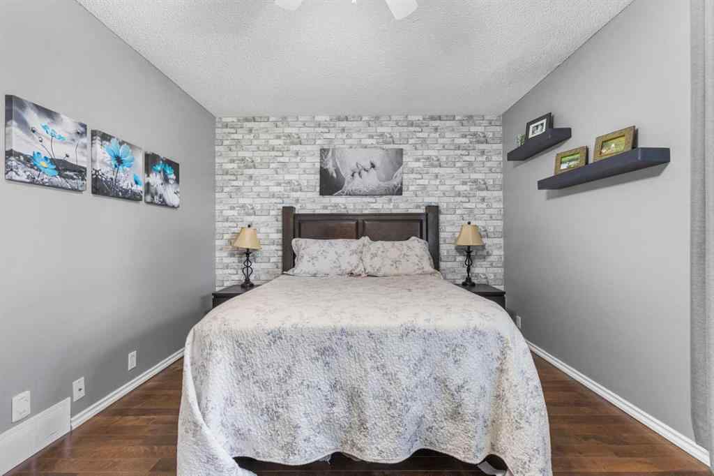 MLS® A2255008 - 67 Woodhill Court SW in Woodlands Calgary, Residential