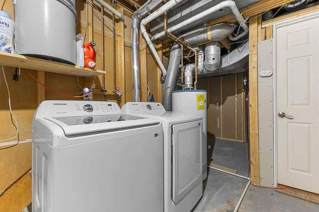 MLS® A2255008 - 67 Woodhill Court SW in Woodlands Calgary, Residential