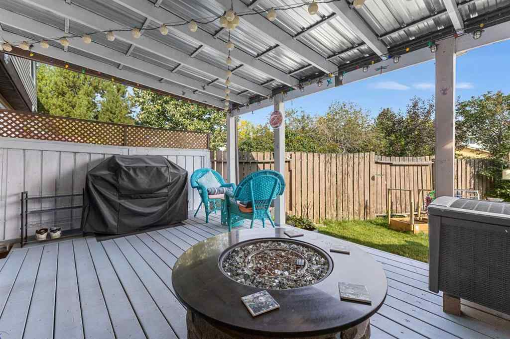 MLS® A2255008 - 67 Woodhill Court SW in Woodlands Calgary, Residential