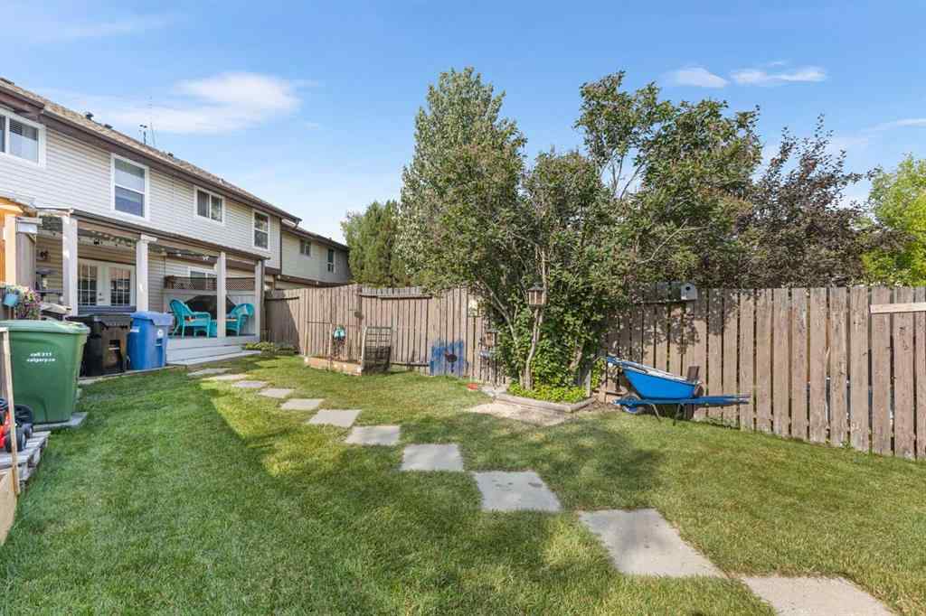 MLS® A2255008 - 67 Woodhill Court SW in Woodlands Calgary, Residential