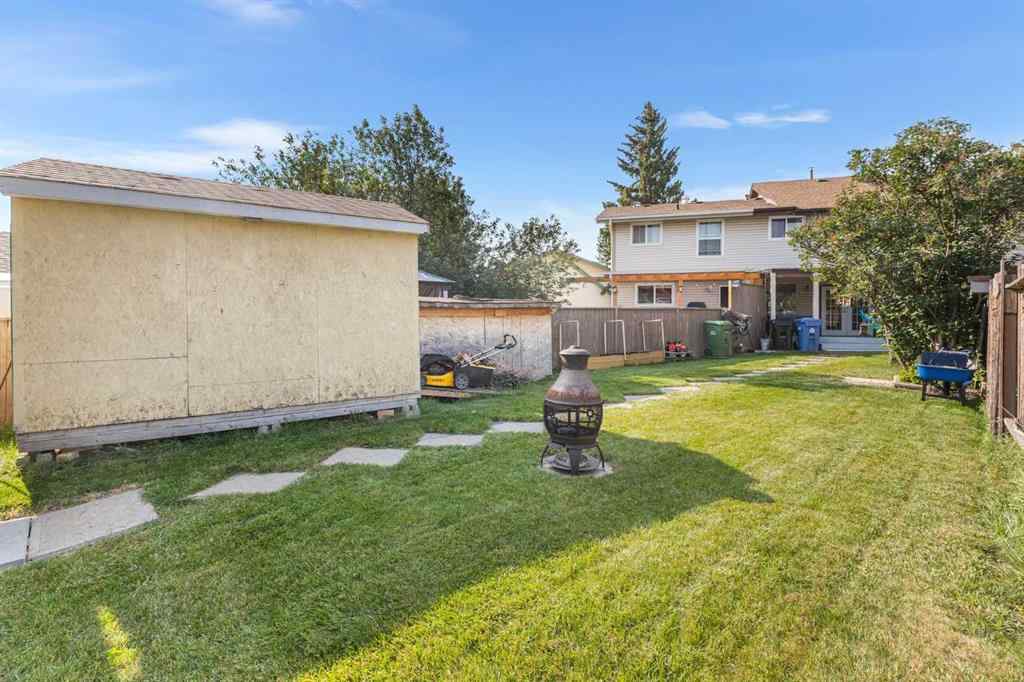 MLS® A2255008 - 67 Woodhill Court SW in Woodlands Calgary, Residential