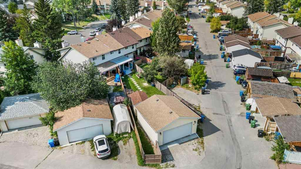 MLS® A2255008 - 67 Woodhill Court SW in Woodlands Calgary, Residential
