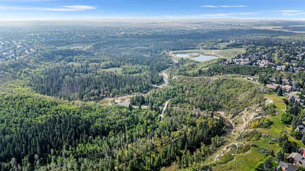 MLS® A2255008 - 67 Woodhill Court SW in Woodlands Calgary, Residential