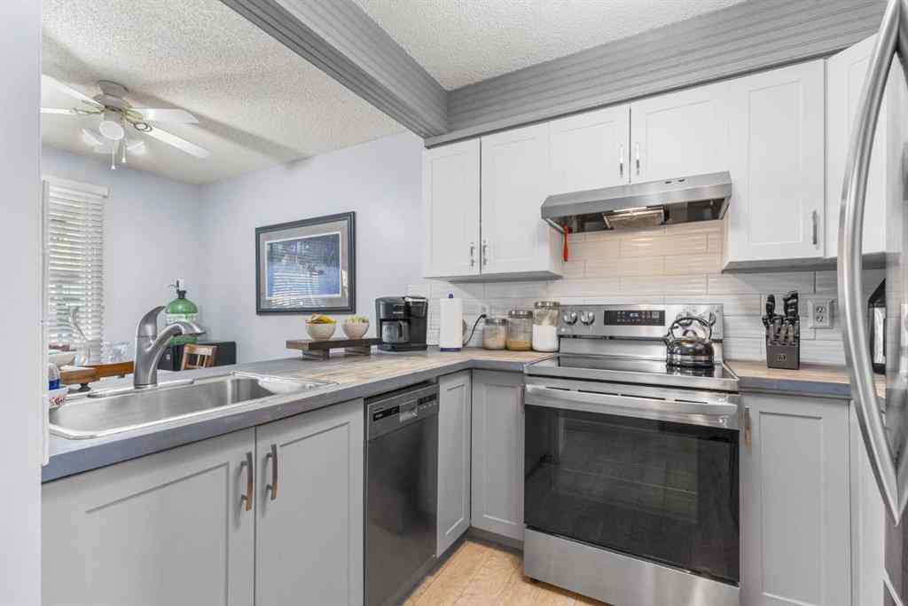 MLS® A2255008 - 67 Woodhill Court SW in Woodlands Calgary, Residential