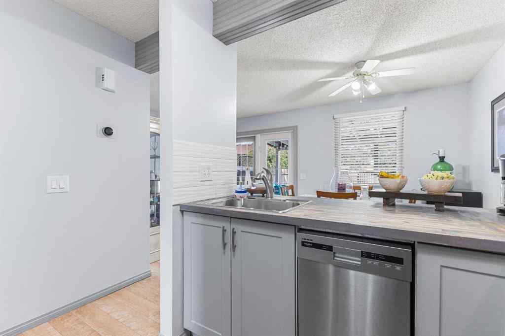 MLS® A2255008 - 67 Woodhill Court SW in Woodlands Calgary, Residential
