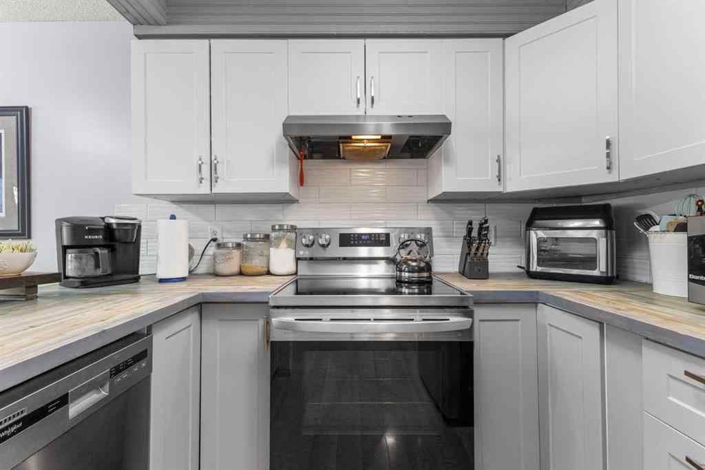 MLS® A2255008 - 67 Woodhill Court SW in Woodlands Calgary, Residential