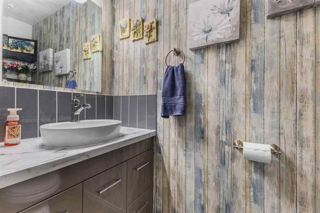 MLS® A2255008 - 67 Woodhill Court SW in Woodlands Calgary, Residential
