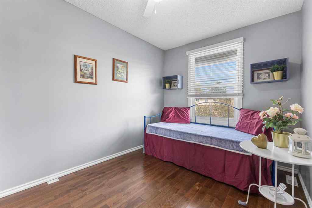 MLS® A2255008 - 67 Woodhill Court SW in Woodlands Calgary, Residential