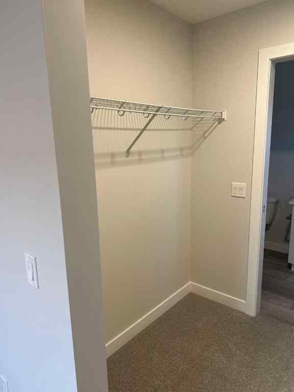 MLS® A2255015 - 105 Tuscany Summit Square NW in Tuscany Calgary, Residential