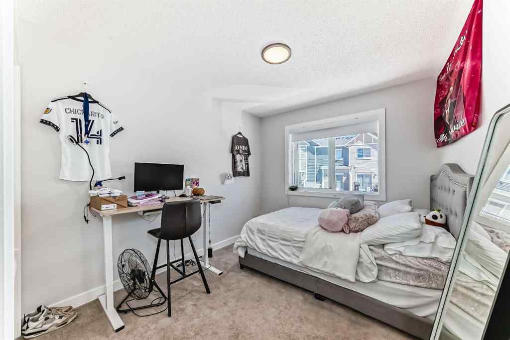 MLS® A2255015 - 105 Tuscany Summit Square NW in Tuscany Calgary, Residential