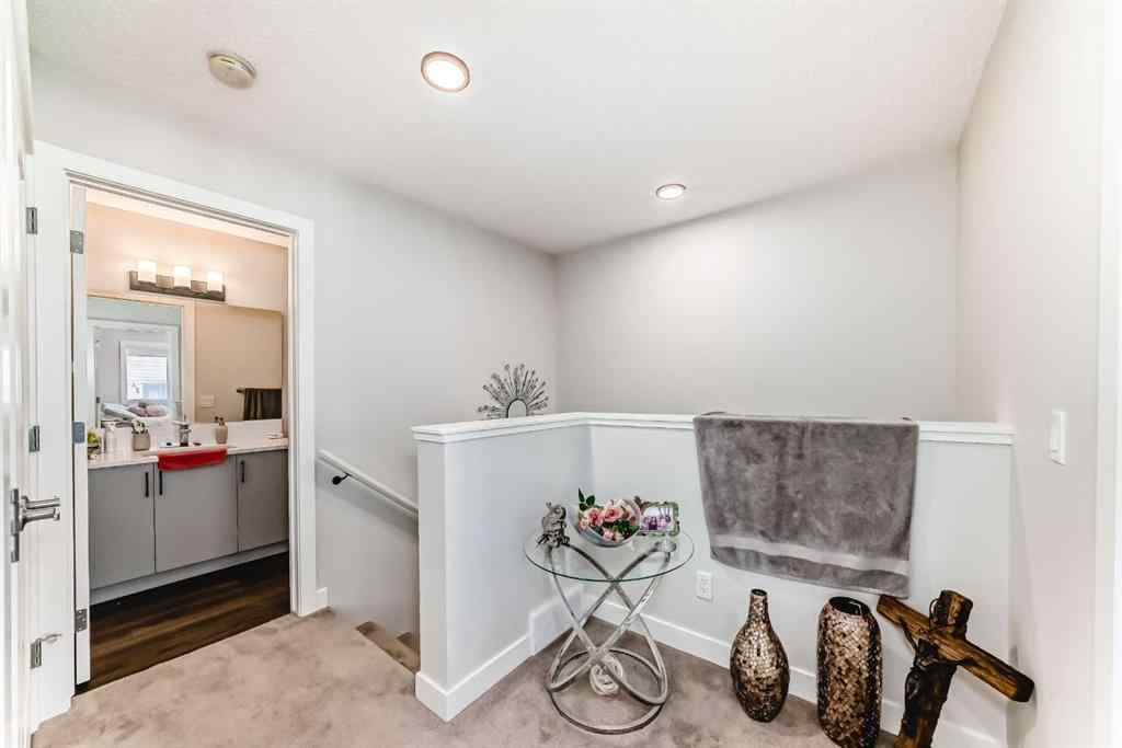 MLS® A2255015 - 105 Tuscany Summit Square NW in Tuscany Calgary, Residential