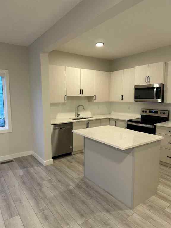 MLS® A2255015 - 105 Tuscany Summit Square NW in Tuscany Calgary, Residential