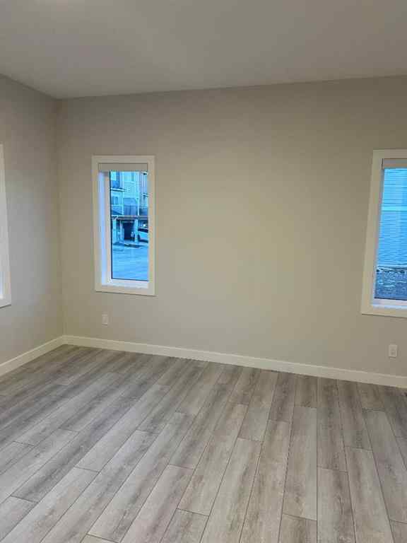 MLS® A2255015 - 105 Tuscany Summit Square NW in Tuscany Calgary, Residential