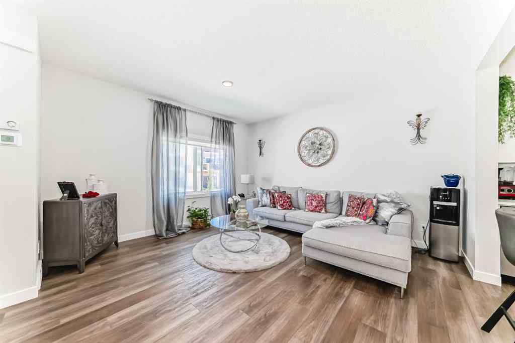 MLS® A2255015 - 105 Tuscany Summit Square NW in Tuscany Calgary, Residential