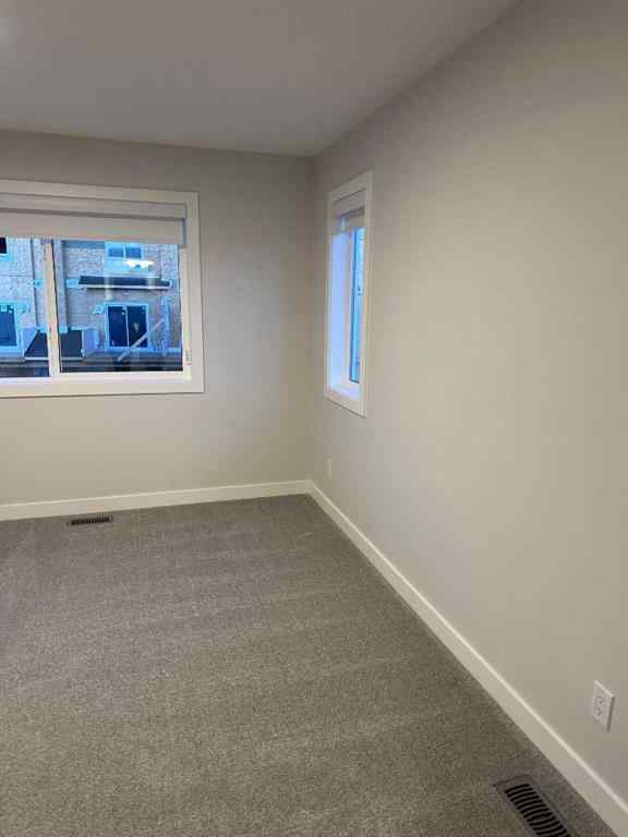 MLS® A2255015 - 105 Tuscany Summit Square NW in Tuscany Calgary, Residential