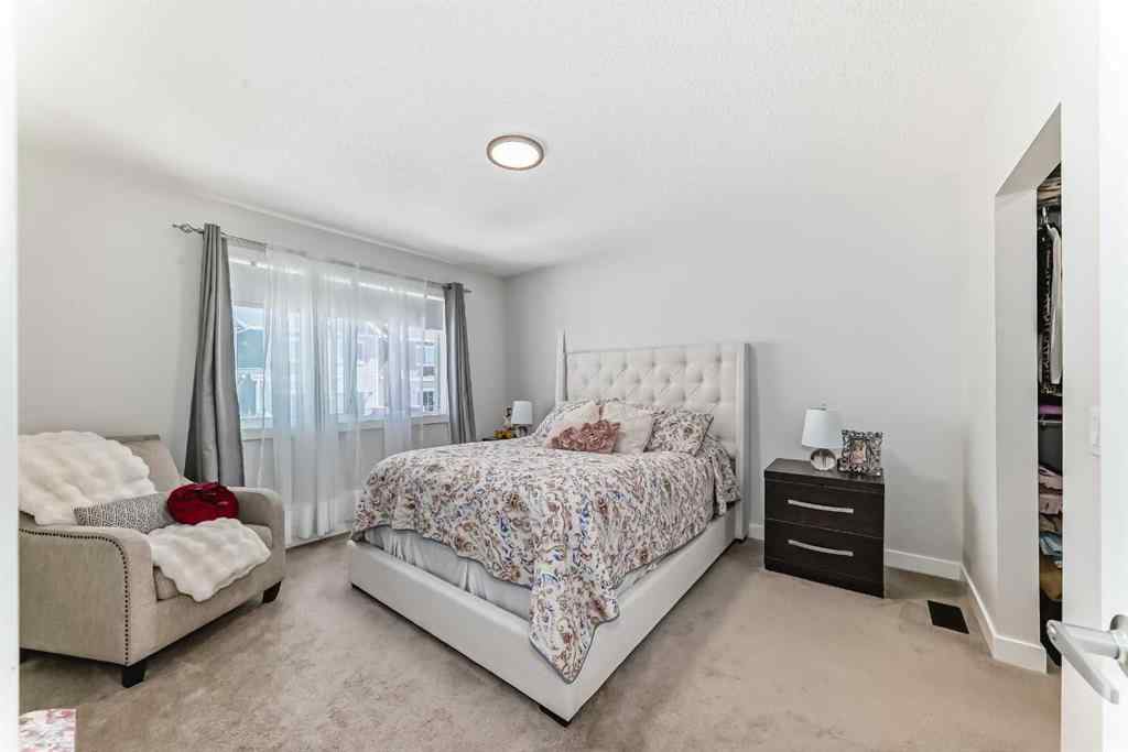 MLS® A2255015 - 105 Tuscany Summit Square NW in Tuscany Calgary, Residential