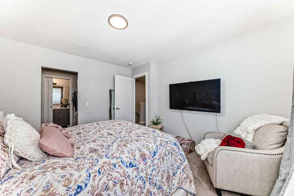 MLS® A2255015 - 105 Tuscany Summit Square NW in Tuscany Calgary, Residential