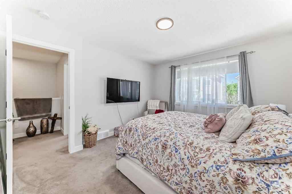 MLS® A2255015 - 105 Tuscany Summit Square NW in Tuscany Calgary, Residential