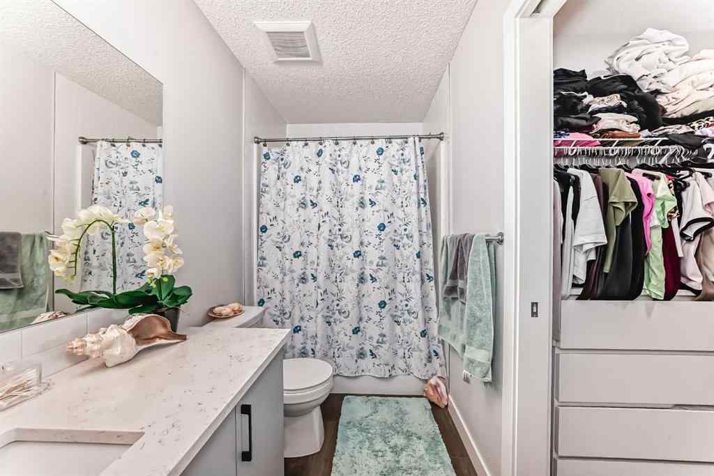 MLS® A2255015 - 105 Tuscany Summit Square NW in Tuscany Calgary, Residential