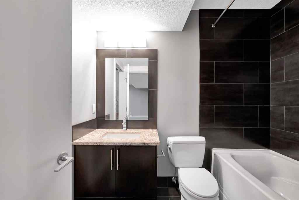 MLS® A2255028 - Unit #1 311 15 Avenue NE in Crescent Heights Calgary, Residential