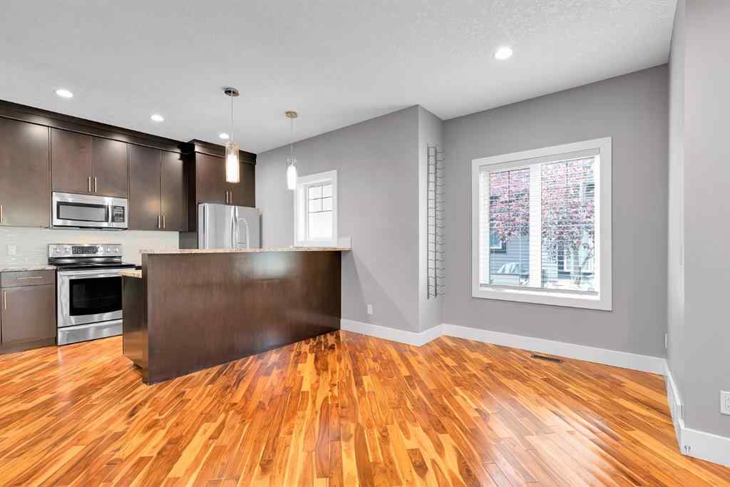 MLS® A2255028 - Unit #1 311 15 Avenue NE in Crescent Heights Calgary, Residential