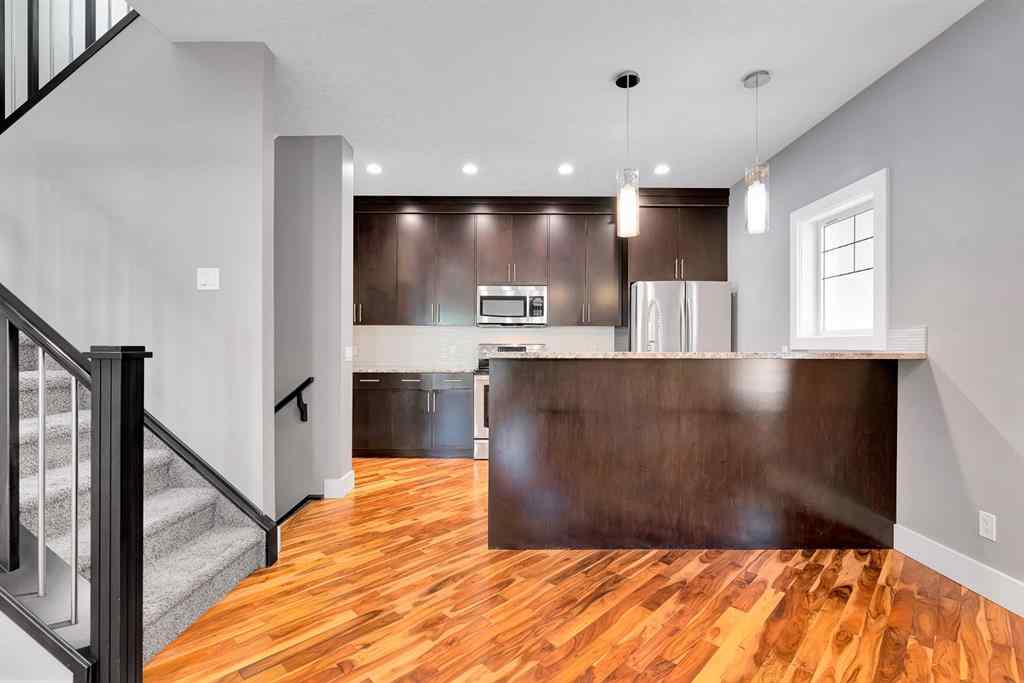 MLS® A2255028 - Unit #1 311 15 Avenue NE in Crescent Heights Calgary, Residential