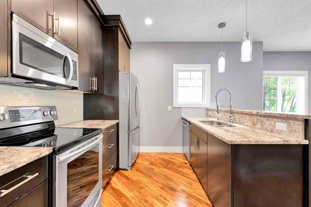 MLS® A2255028 - Unit #1 311 15 Avenue NE in Crescent Heights Calgary, Residential