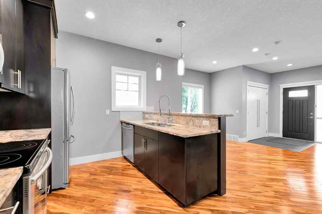 MLS® A2255028 - Unit #1 311 15 Avenue NE in Crescent Heights Calgary, Residential
